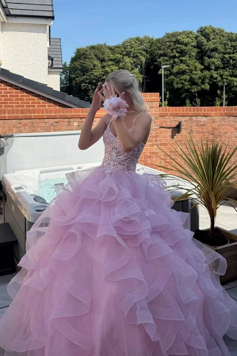 Front view of a Loverlm lilac ball gown prom dress with floral lace appliques, spaghetti straps, and cascading floor-length ruffles.