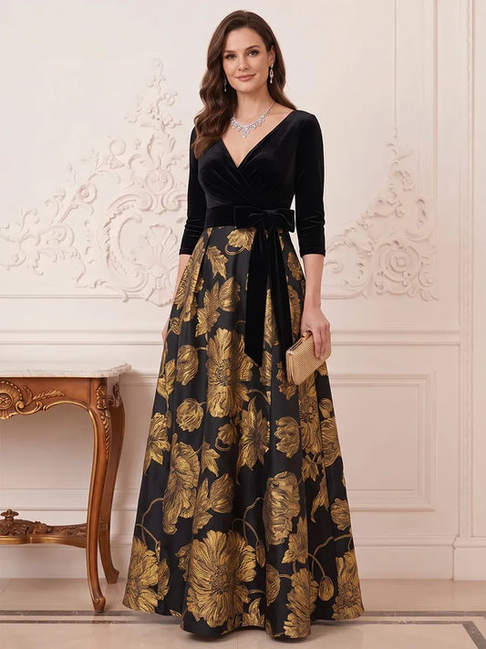 Loverlm black and gold floral Mother of the Bride dress with velvet-look V-neck bodice, three-quarter sleeves, waist bow and A-line maxi skirt