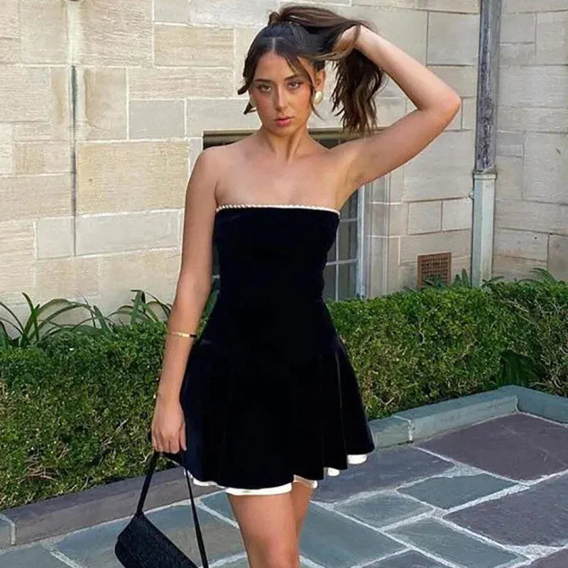Loverlm black A-line mini homecoming dress with strapless straight neckline, fitted bodice and contrasting hem trim