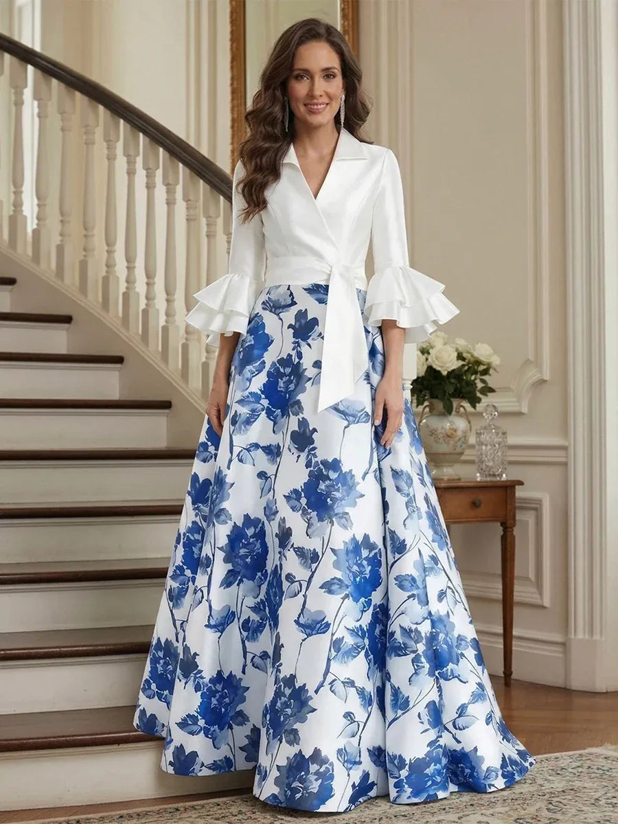 Loverlm blue and white floral mother of the bride dress front view with notched collar, ruffle sleeves, waist sash and floor-length A-line skirt
