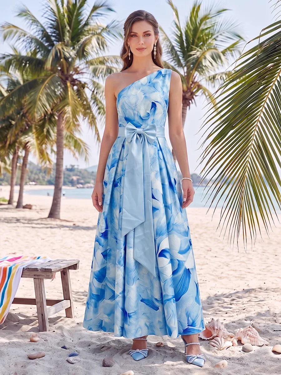 Loverlm blue floral one shoulder wedding guest dress front view with oversized waist bow and pleated A-line maxi skirt