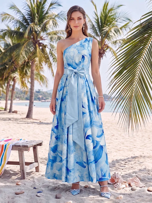 Loverlm blue floral one shoulder wedding guest dress front view with oversized waist bow and pleated A-line maxi skirt