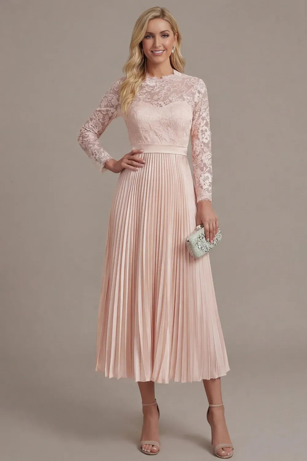 Loverlm blush pink wedding guest dress with a floral lace bodice, sheer long sleeves, defined waist and pleated tea-length A-line skirt.