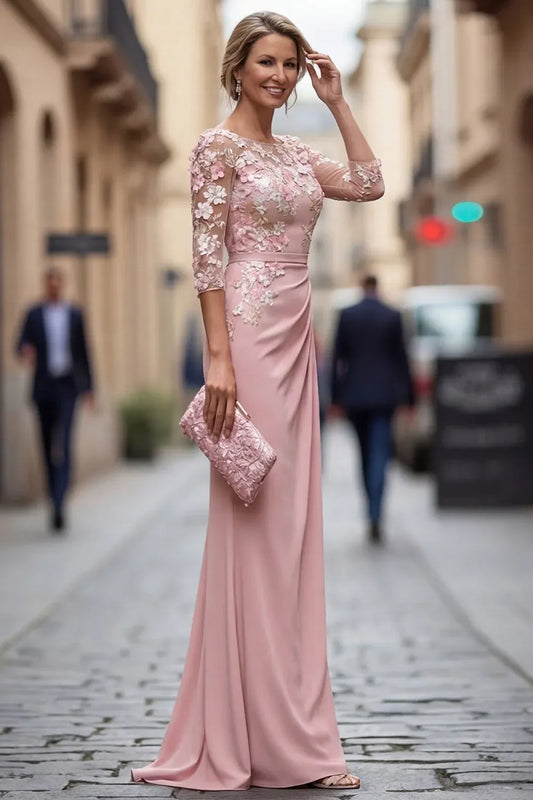 Loverlm blush sheath gown with a bateau neckline, floral lace bodice, sheer three-quarter sleeves and a ruched floor-length skirt.