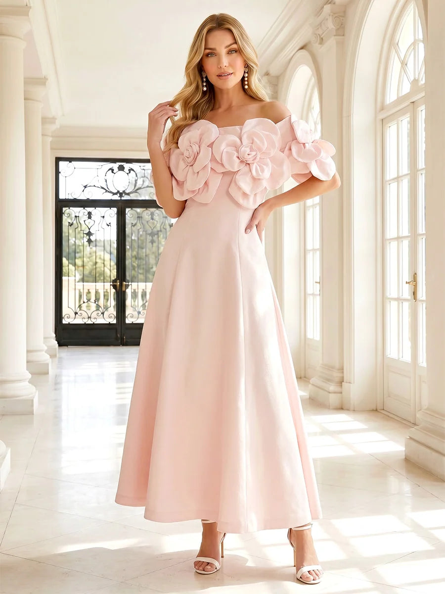 Blush pink satin A-line wedding guest dress with off-shoulder neckline, oversized 3D floral roses, fitted waist and elegant midi skirt by Loverlm