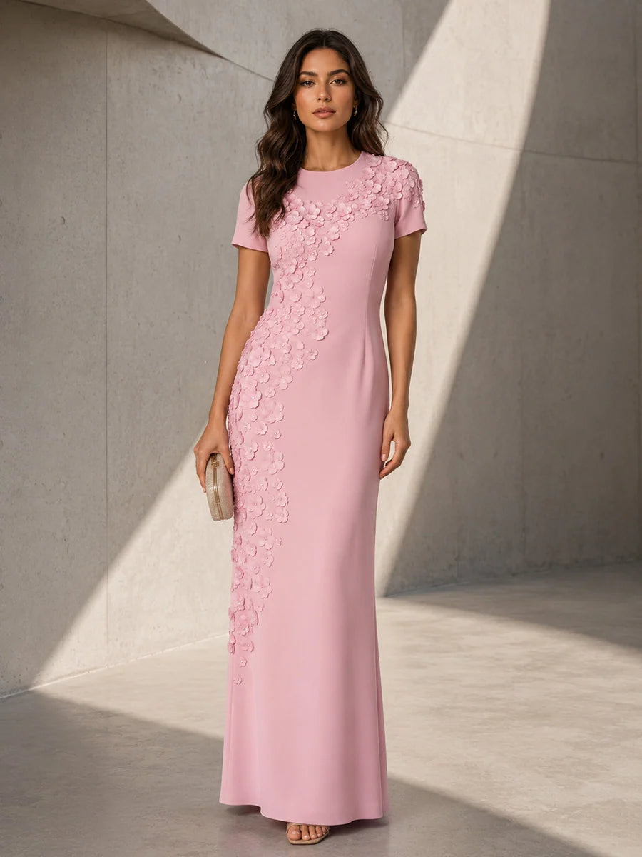 Blush pink sheath evening dress with round neckline, short sleeves, cascading 3D floral appliques and floor-length crepe skirt by Loverlm