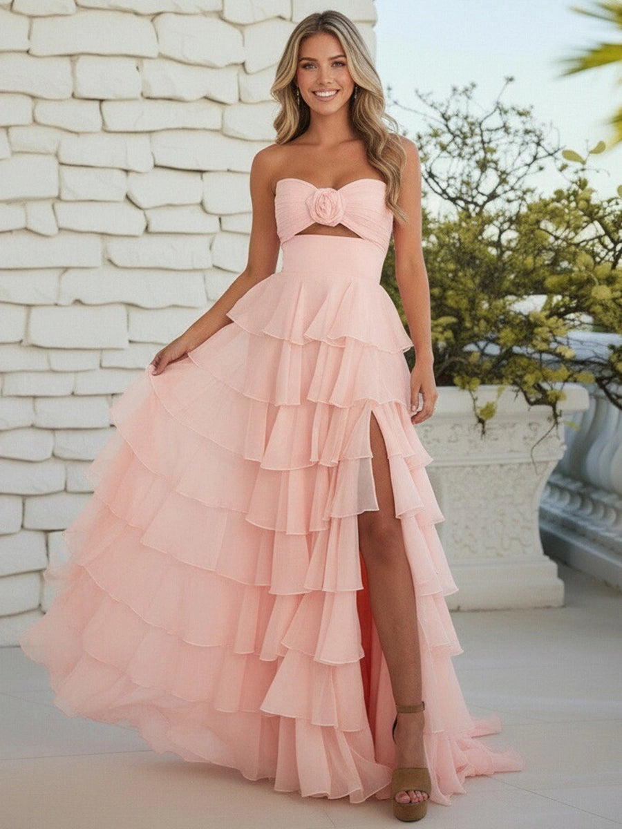 Blush pink chiffon A-line prom dress with sweetheart neckline floral detail tiered ruffles and high slit by Loverlm