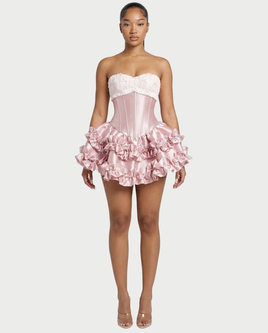 Loverlm blush pink mini Homecoming dress with strapless sweetheart corset bodice bow details and layered satin ruffle skirt