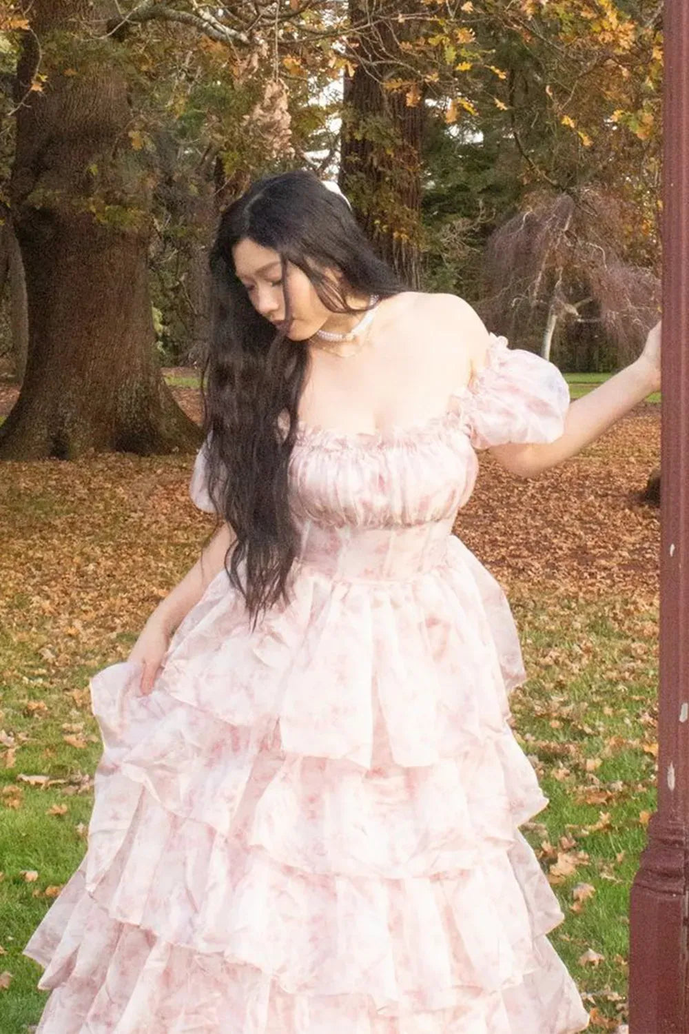 Loverlm blush pink floral A-line prom dress with square neckline, puff sleeves, corset bodice and five-tier ruffle skirt front view
