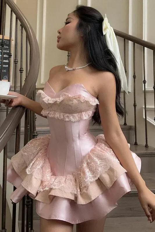 Loverlm blush pink strapless homecoming dress with corset bodice lace ruffles and layered mini A-line skirt