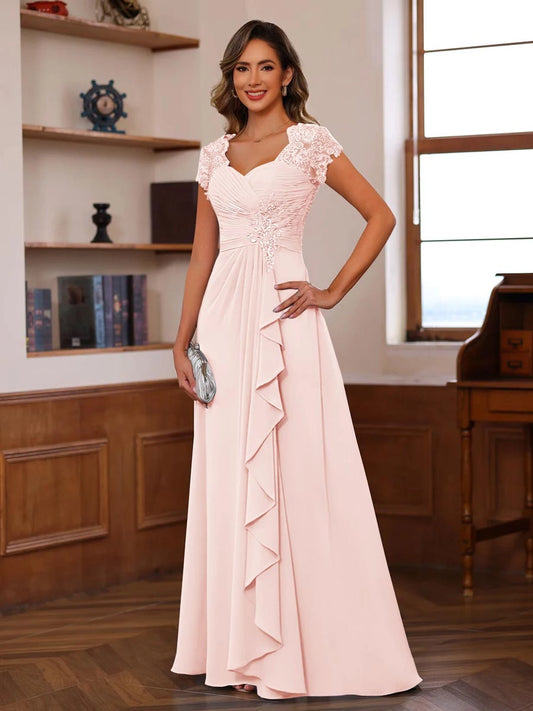 Loverlm blush pink A-line mother of the bride dress front view with ruched V-neck, lace cap sleeves, floral waist appliques and cascading ruffle skirt