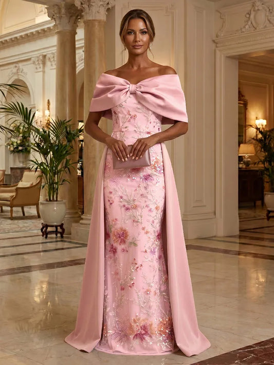 Loverlm blush pink Mother of the Bride dress with off-shoulder bow neckline floral embellished panel and satin floor-length overskirt