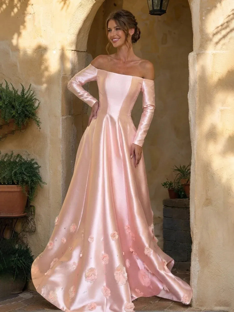 Front view of Loverlm blush pink off-shoulder long sleeve prom dress with 3D floral appliques and floor-length A-line skirt