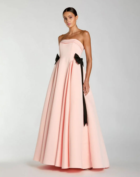 Loverlm blush pink strapless prom dress with black waist bows and elegant full A-line floor-length skirt