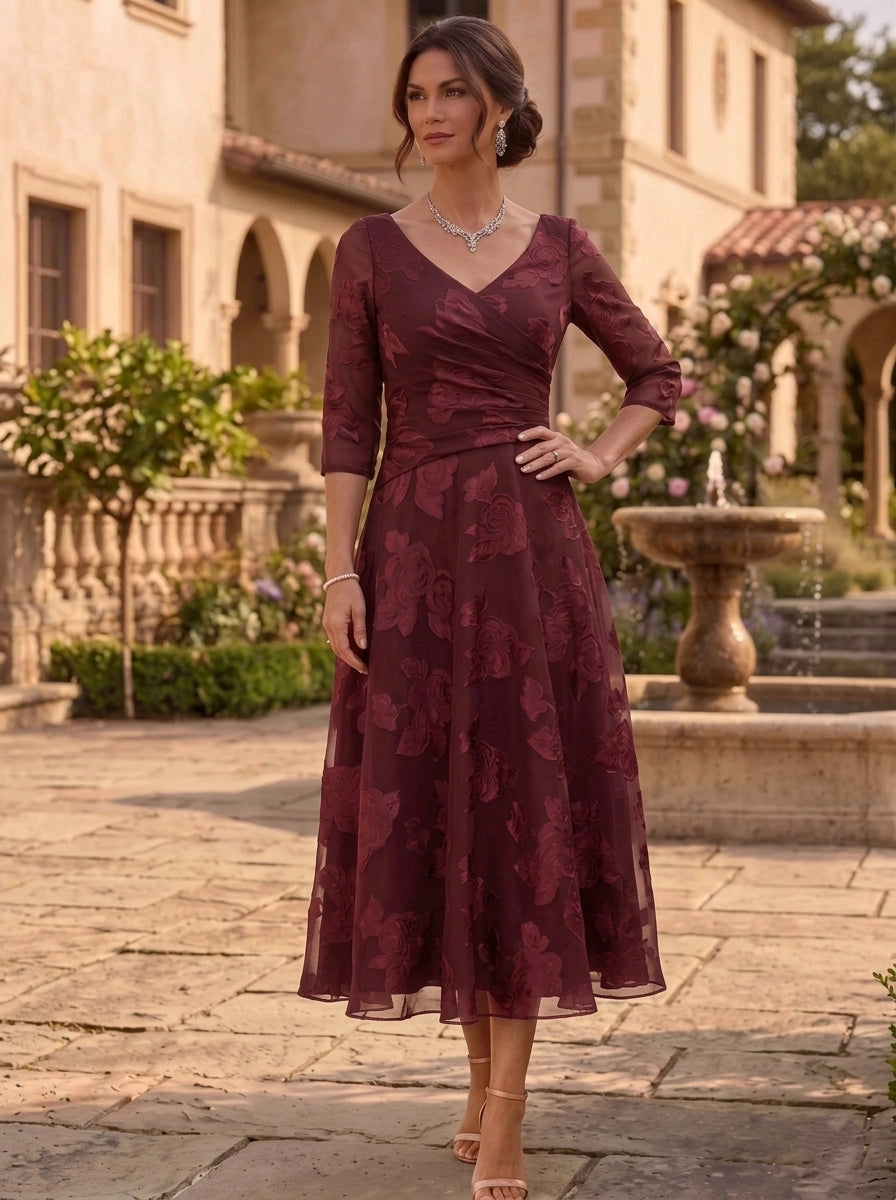 Burgundy floral A-line Mother of the Bride dress with V-neck ruched waist and three quarter sleeves by Loverlm