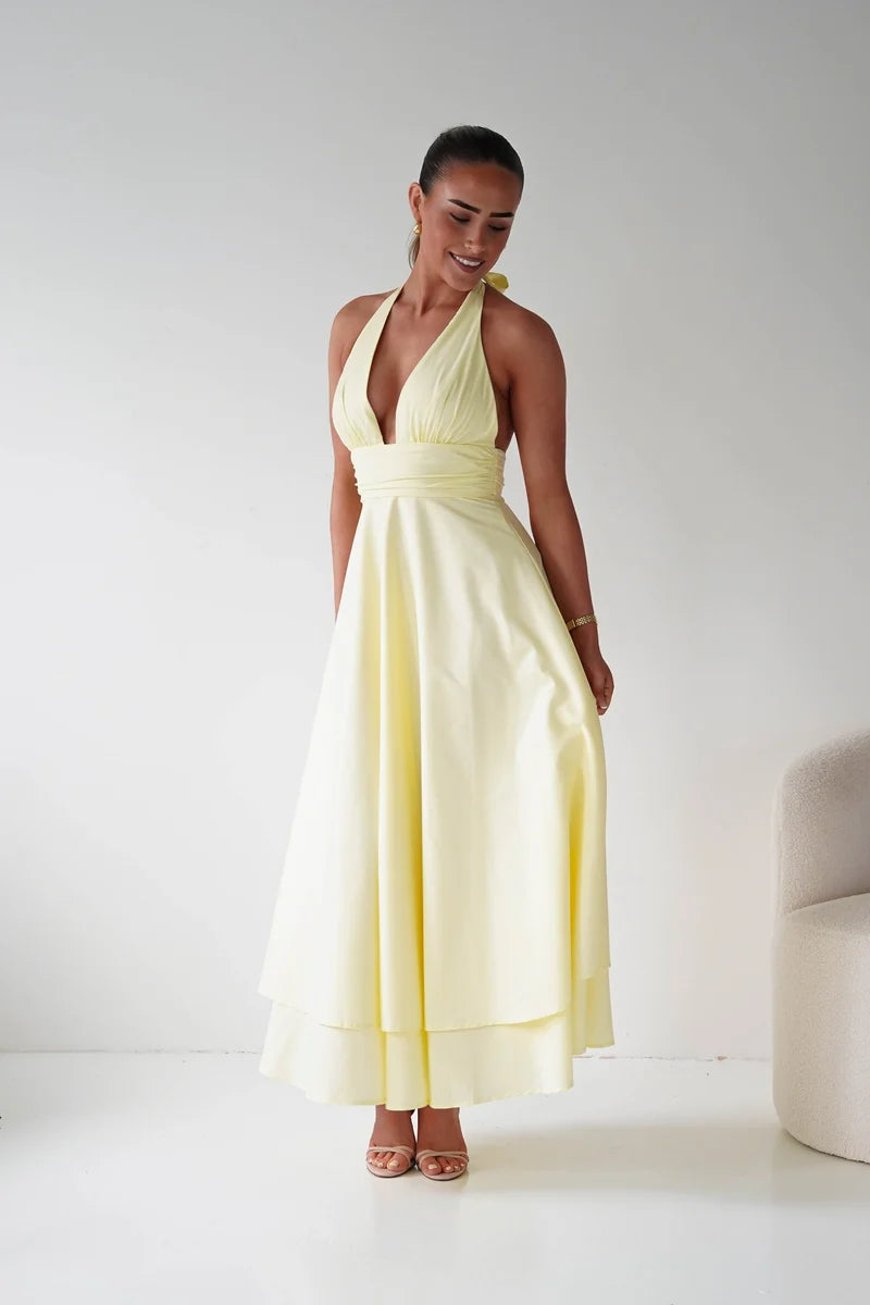 Loverlm butter yellow chiffon wedding guest dress with plunging halter V-neckline, gathered waist and layered A-line maxi skirt front view