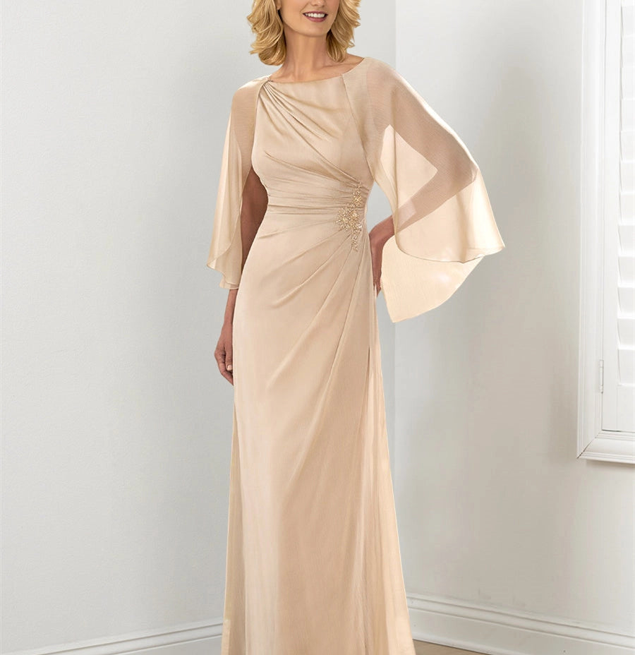 Champagne Mother of the Bride Dress with bateau neckline, sheer cape sleeves, sparkling beaded waist, asymmetrical ruching and floor-length sheath skirt by Loverlm.