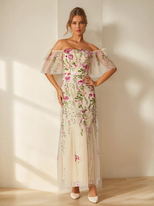 Front view of Loverlm champagne floral embroidered off-shoulder maxi wedding guest dress with sheer flutter sleeves