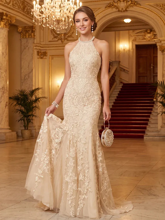 Front view of Loverlm champagne halter mermaid evening dress with floral lace appliques and floor-length sweep train