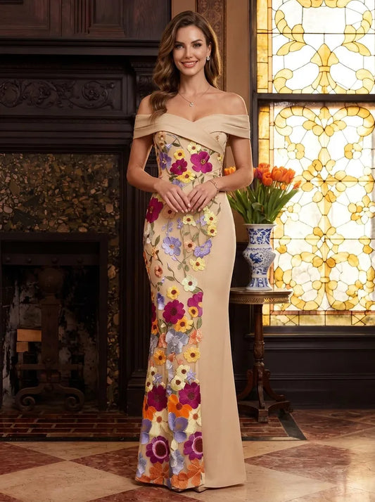 Loverlm champagne Mother of the Bride dress with off-shoulder neckline colorful floral appliqué fitted bodice and floor-length mermaid silhouette