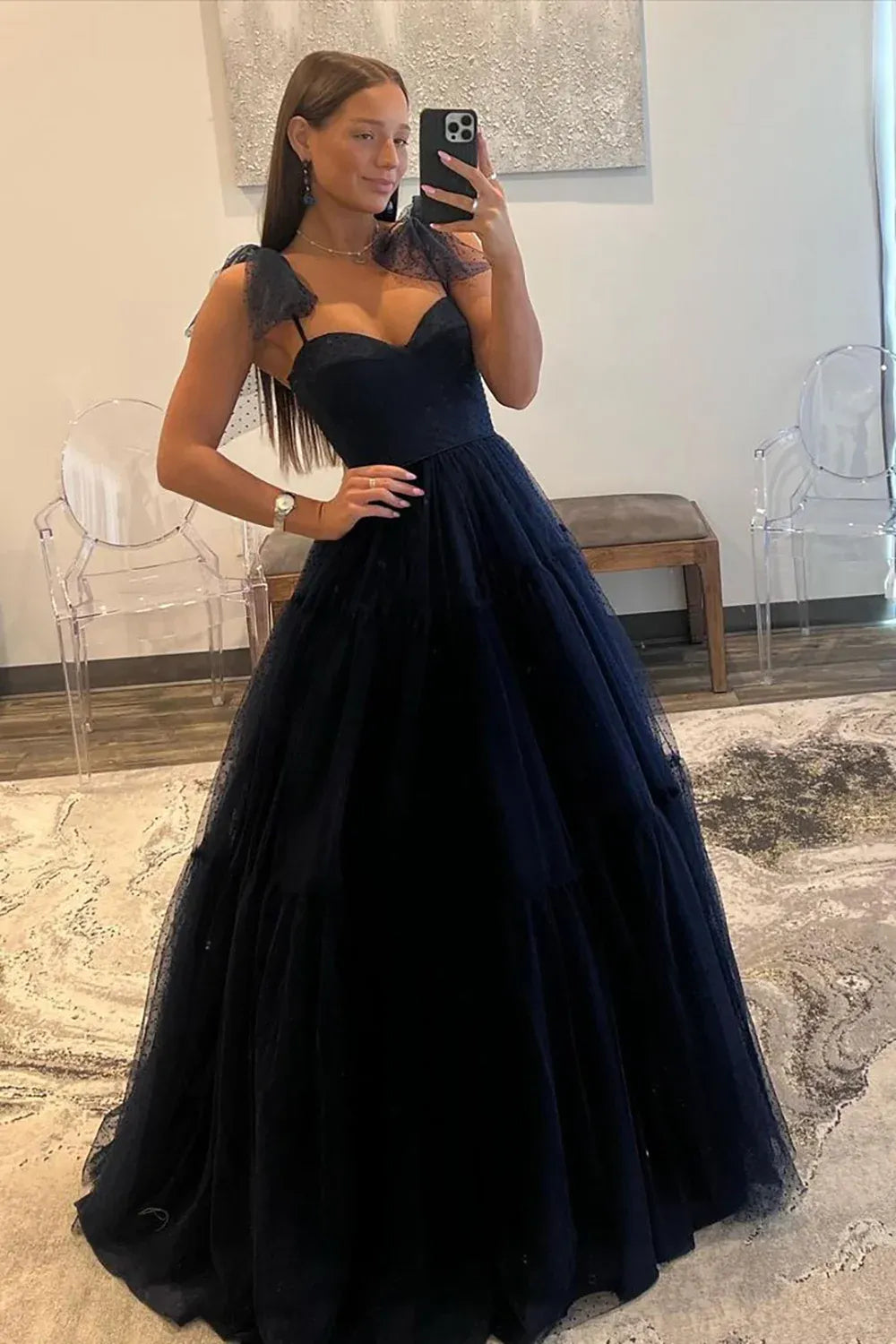 Loverlm dark navy dotted tulle A-line prom dress with a sweetheart neckline, oversized shoulder bows and a full floor-length skirt.