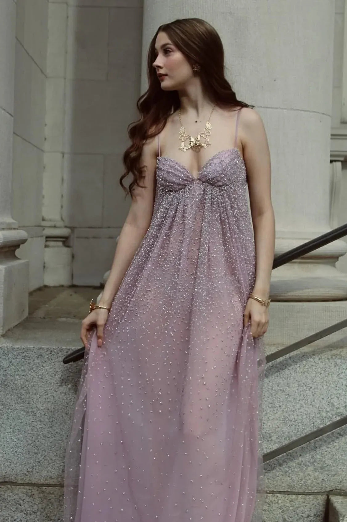 Front view of Loverlm dusty mauve beaded tulle prom dress with a sweetheart neckline, spaghetti straps, empire waist and flowing A-line skirt.