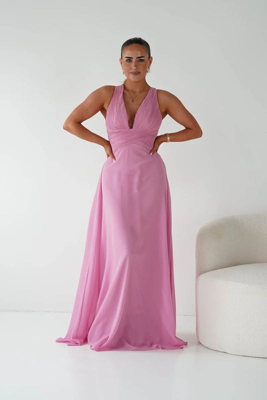 Loverlm dusty pink A-line bridesmaid dress with plunging V-neckline, pleated bodice, crossover waistband and flowing floor-length skirt front view
