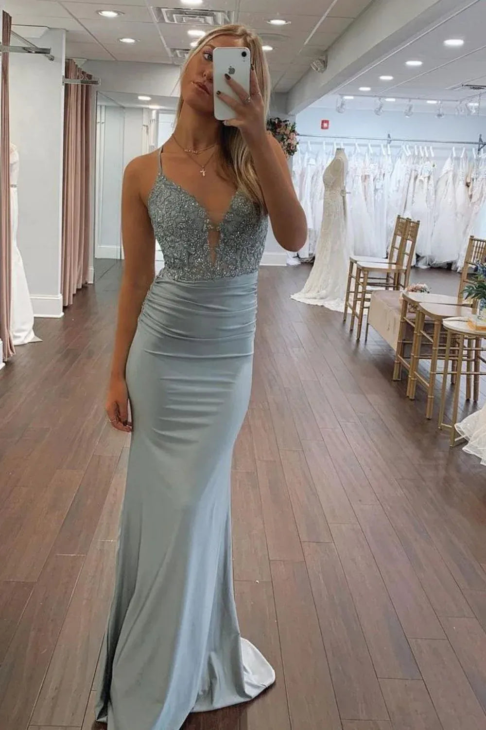 Loverlm dusty sage green prom dress with a sparkling plunging bodice, spaghetti straps, ruched satin skirt and softly flared hem.