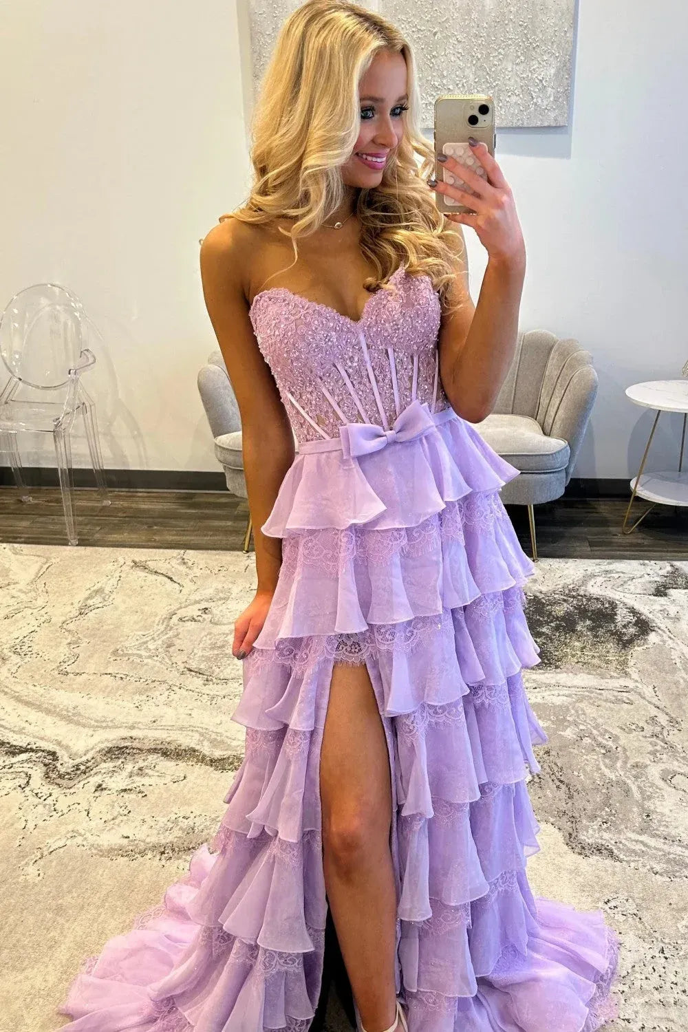 Front view lavender tiered ruffle prom dress, strapless sweetheart beaded corset gown with waist bow and high front slit by Loverlm