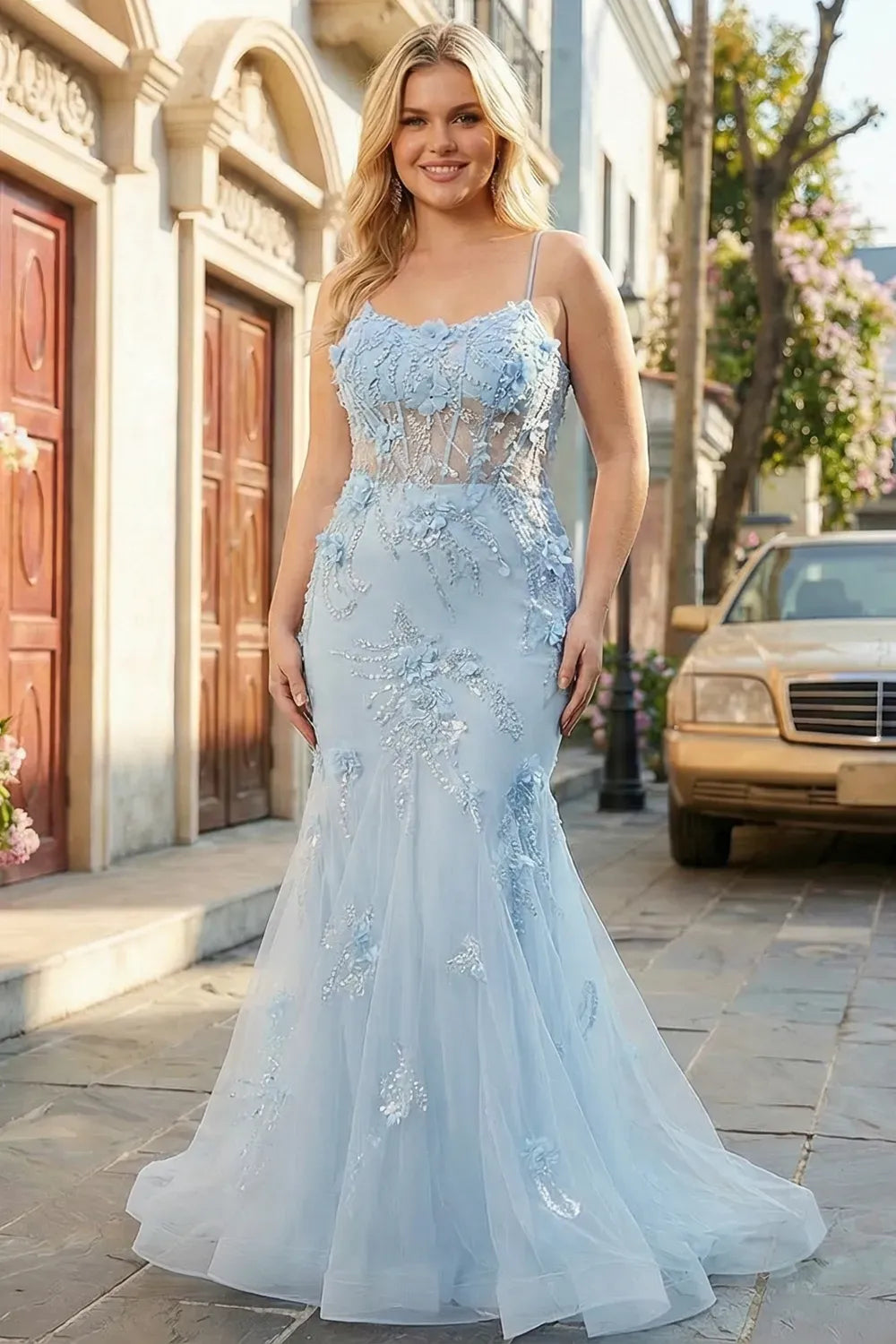 Loverlm light blue mermaid prom dress with spaghetti straps, floral appliqué illusion bodice and flowing tulle skirt front view