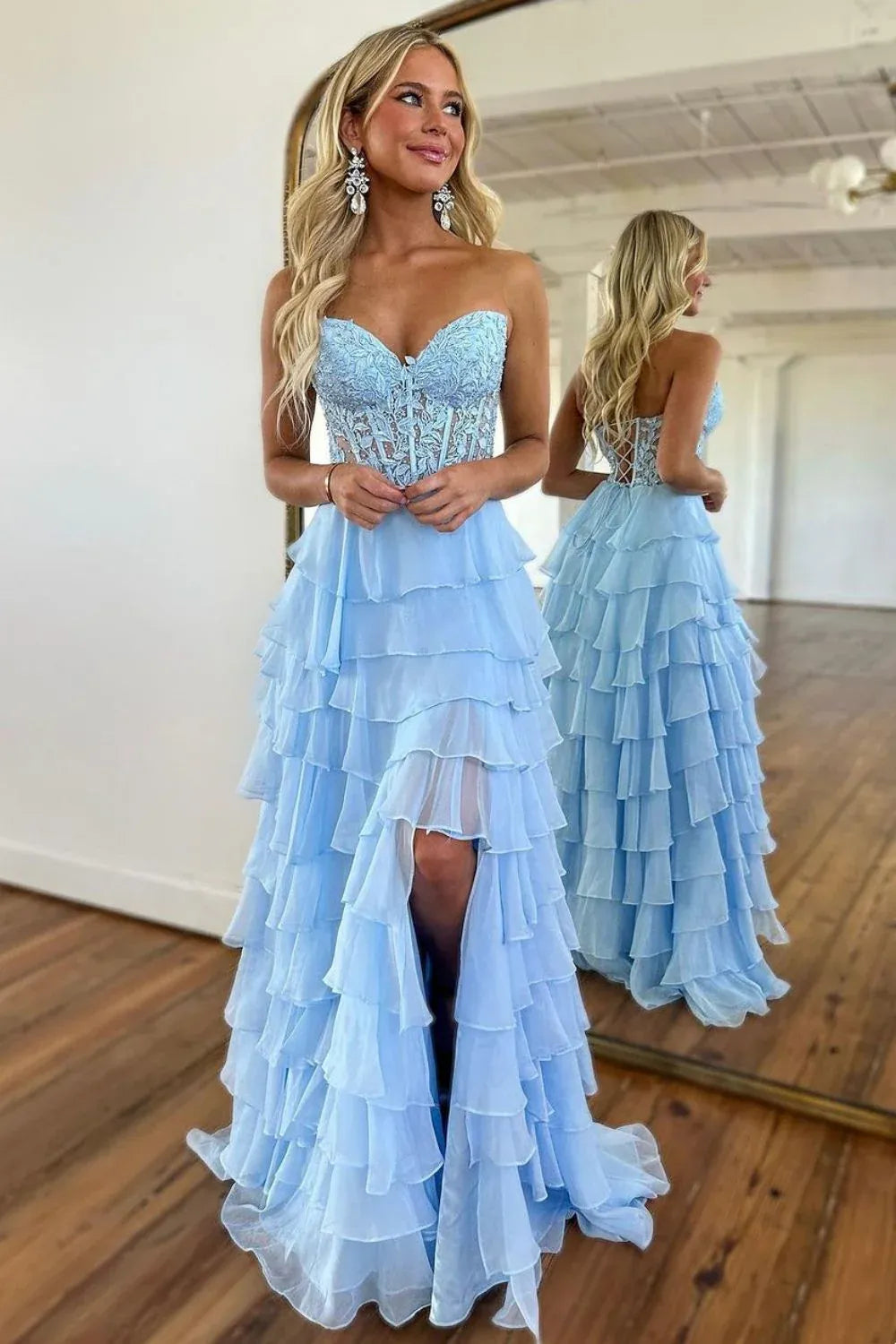 Loverlm light blue prom dress with a strapless sweetheart lace bodice, sheer corset panels, tiered chiffon A-line skirt and high front slit.