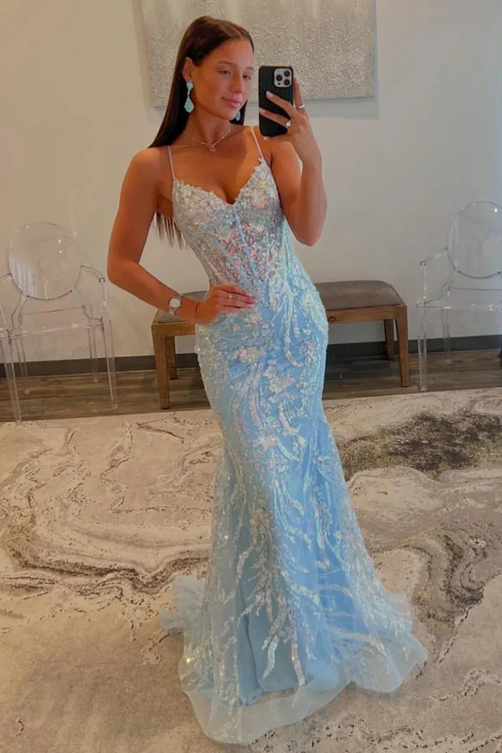 Loverlm light blue sequin mermaid prom dress with a V-neckline, spaghetti straps, fitted paneled bodice and flared floor-length tulle skirt, front view.