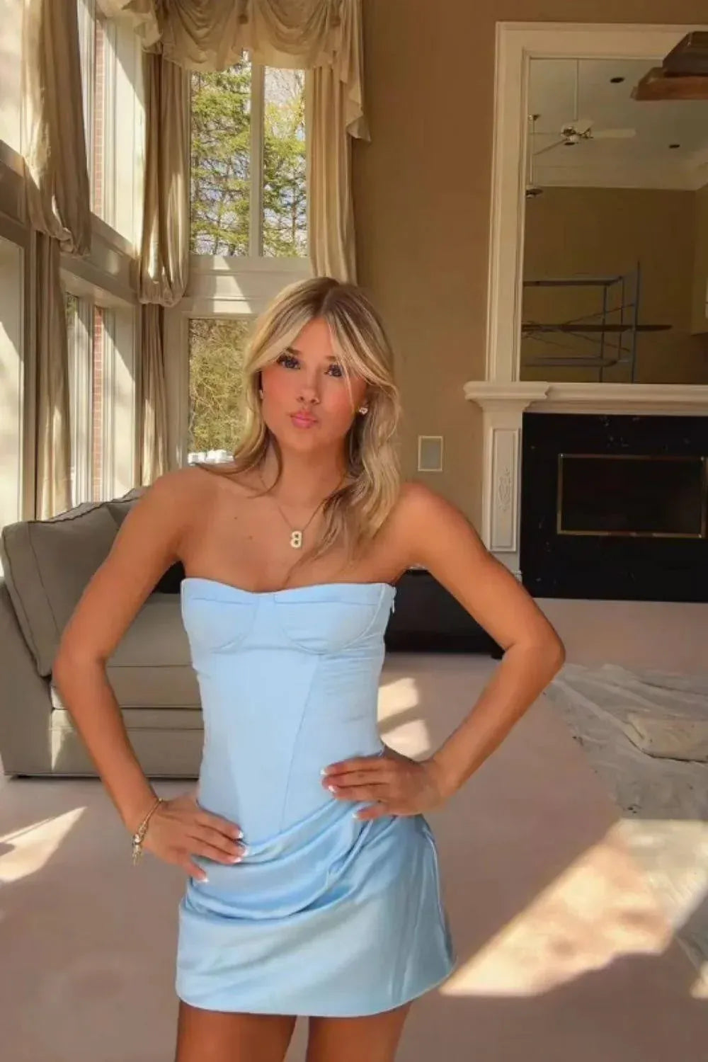 Loverlm light blue strapless satin-look mini homecoming dress with a sweetheart neckline, corset-style bodice and ruched skirt, front view