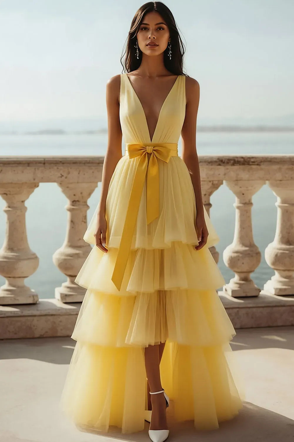 Loverlm light yellow tulle prom dress with plunging V-neckline, wide straps, yellow waist bow and tiered floor-length A-line skirt