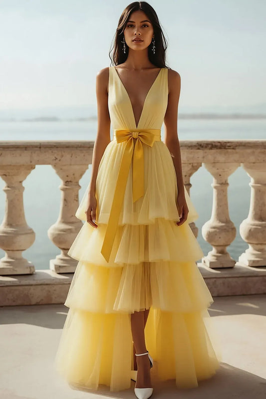 Loverlm light yellow tulle prom dress with plunging V-neckline, wide straps, yellow waist bow and tiered floor-length A-line skirt