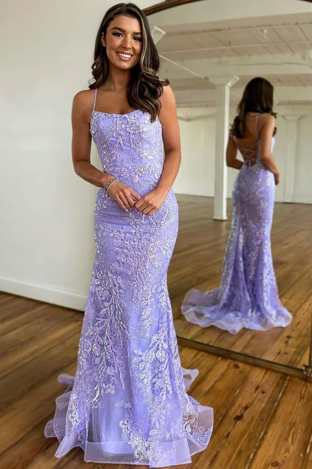 Front view of Loverlm lilac lace mermaid prom dress with a scoop neckline, spaghetti straps and floral appliques.