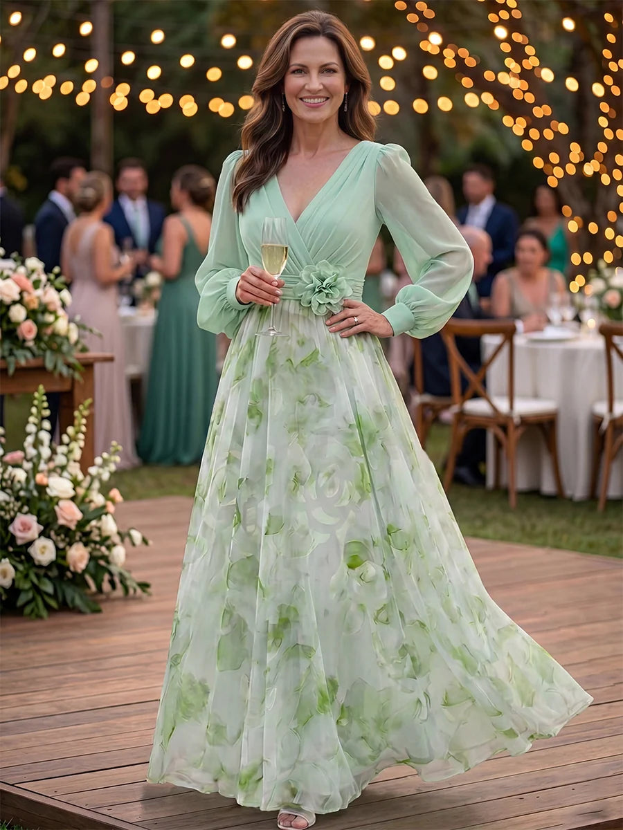 Mint green floral floor-length wedding guest dress with V-neck, sheer long sleeves, and flower waist detail by Loverlm