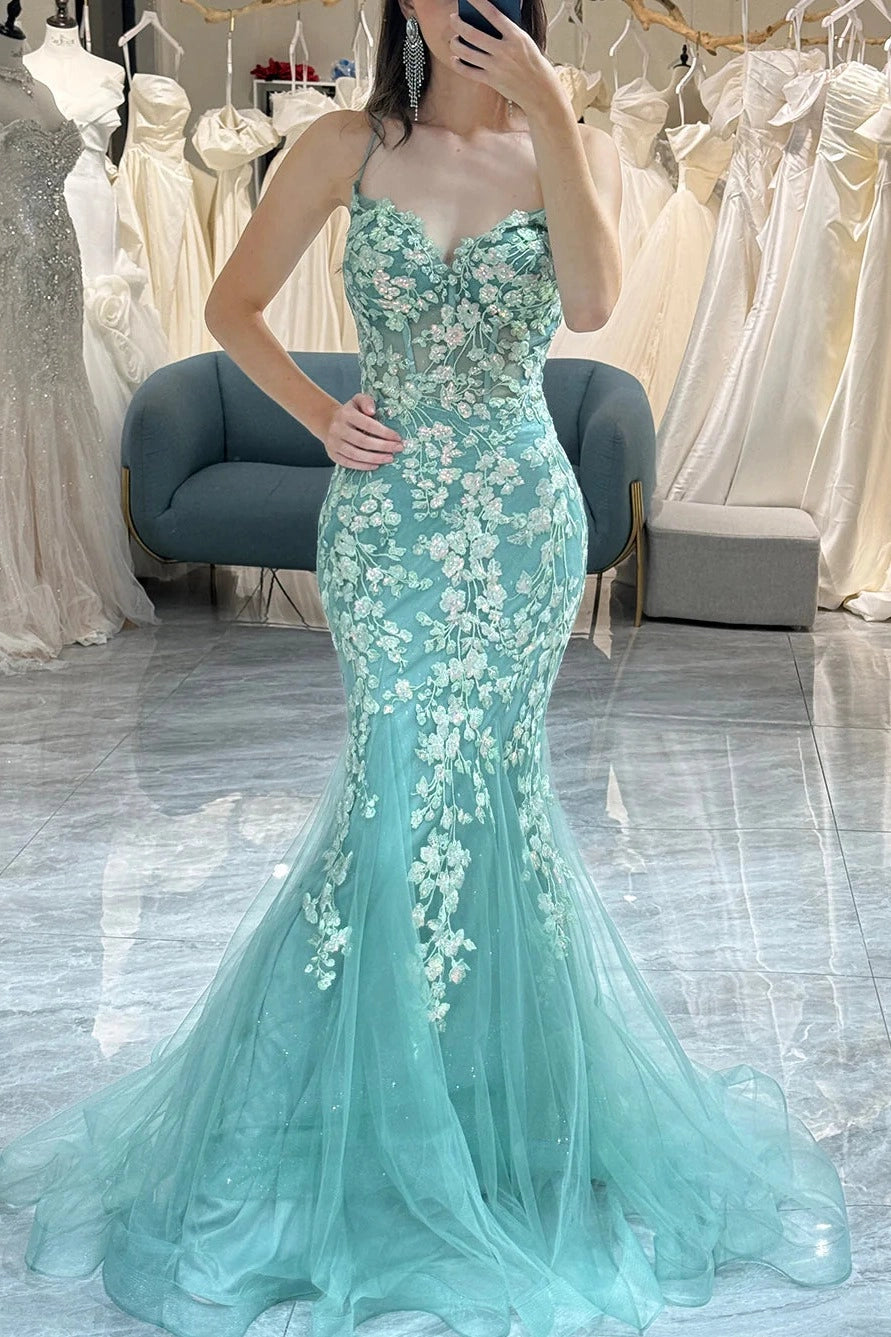 Front view of a Loverlm mint green lace tulle mermaid prom dress with a sweetheart neckline, spaghetti straps, floral appliqués, and a sweeping train.