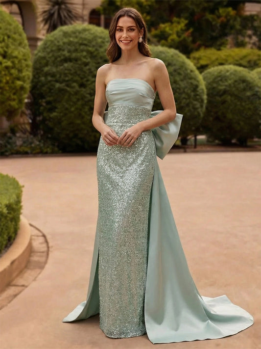 Front view of Loverlm mint green sequined strapless evening dress with satin bodice and floor-length bow train
