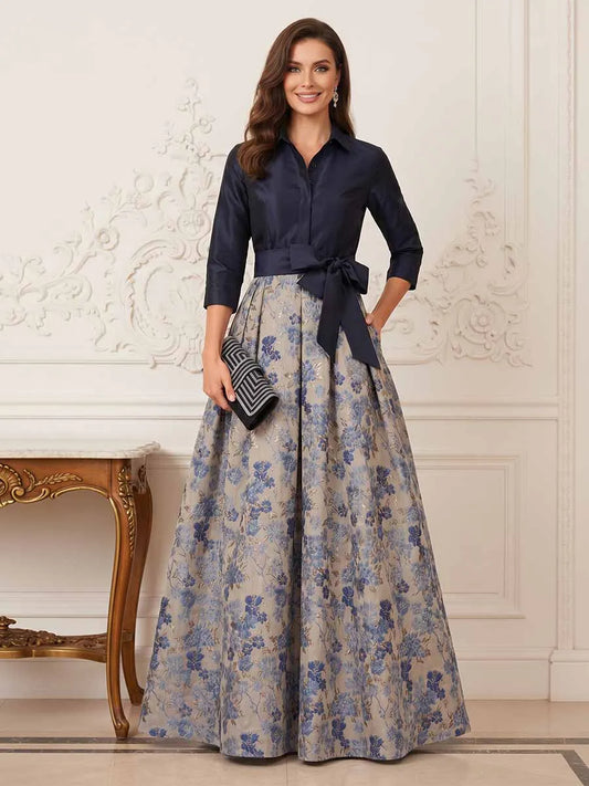 Loverlm navy blue floral Mother of the Bride dress with collared bodice, three-quarter sleeves, waist bow and floor-length A-line skirt front view