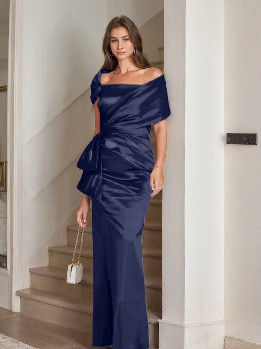 Navy blue off-shoulder Mother of the Bride Dress featuring a draped neckline, statement bow accents, ruched waist and fitted floor-length mermaid silhouette by Loverlm.