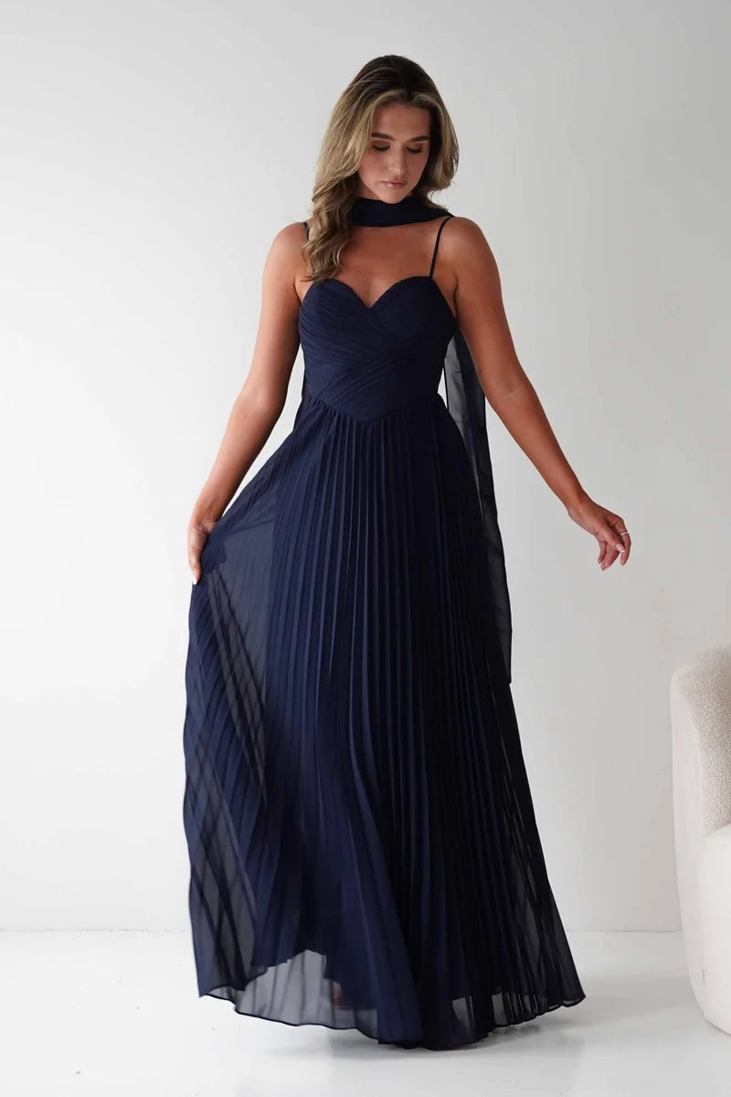 Loverlm navy blue A-line prom dress with sweetheart neckline, spaghetti straps, ruched bodice, pleated maxi skirt and scarf detail front view
