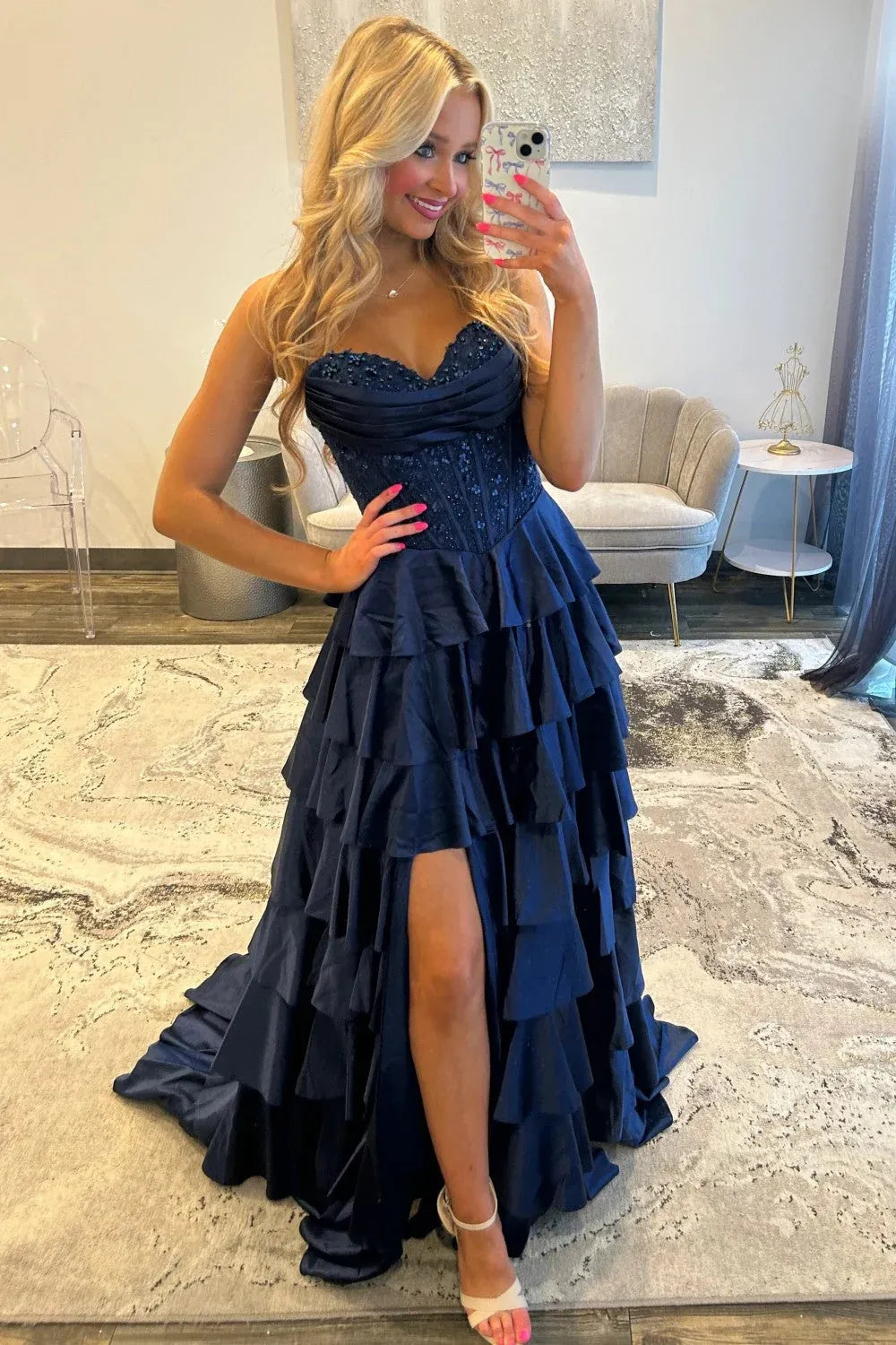 Loverlm navy blue satin prom dress with a strapless sweetheart corset-style bodice, tiered ruffle skirt and a high front slit.