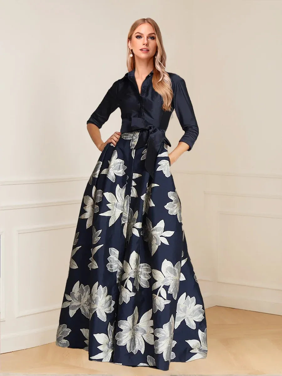Loverlm navy floral Mother of the Bride dress with collared neckline, three-quarter sleeves, bow waist sash and floor-length A-line skirt front view