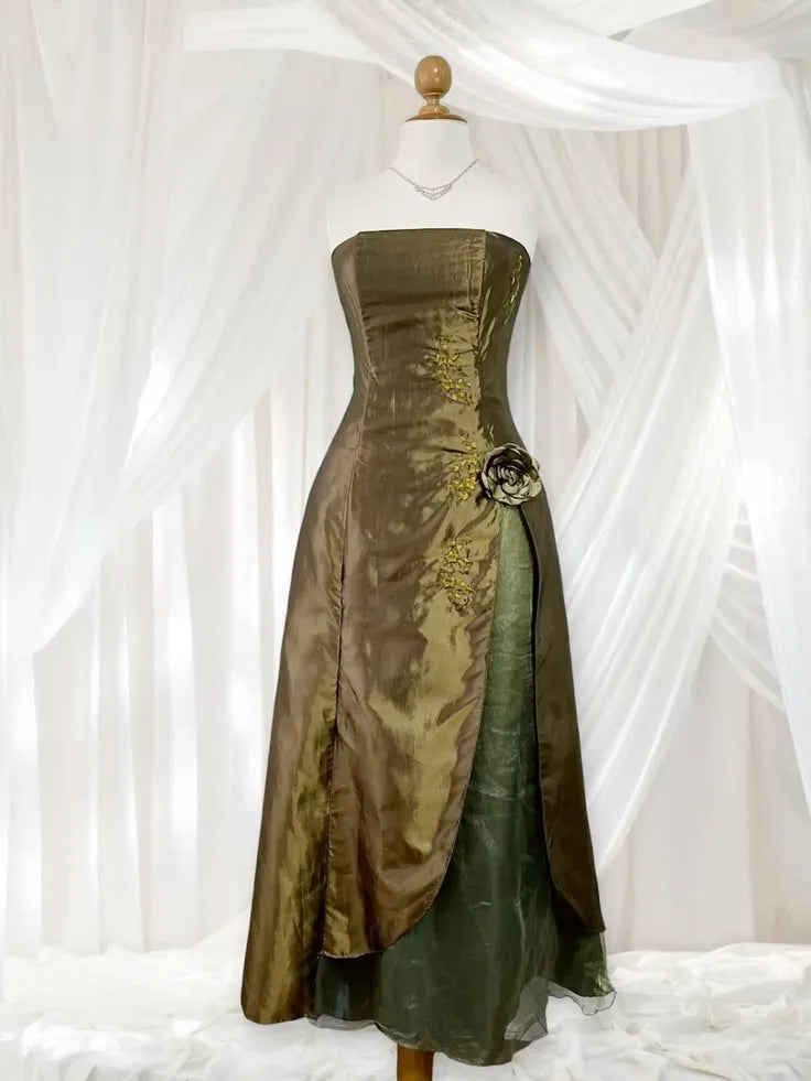 Loverlm olive gold strapless A-line evening dress with floral embroidery, rose hip accent, asymmetrical overskirt and green sheer underlayer front view