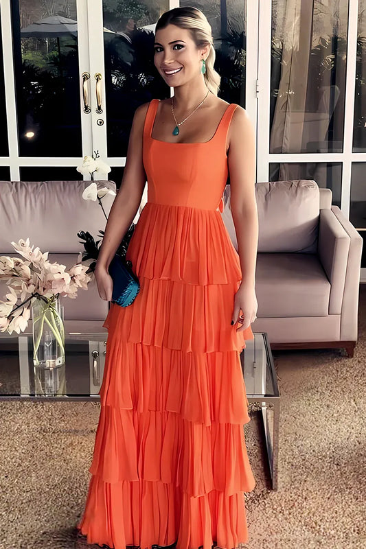 Loverlm orange chiffon maxi wedding guest dress with a square neckline, wide straps, fitted bodice and tiered pleated A-line skirt.