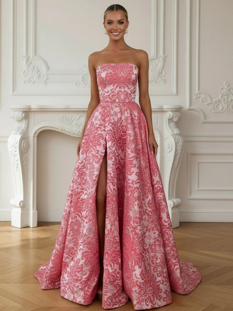 Pink floral brocade A-line prom dress with strapless bodice high slit and floor-length skirt by Loverlm
