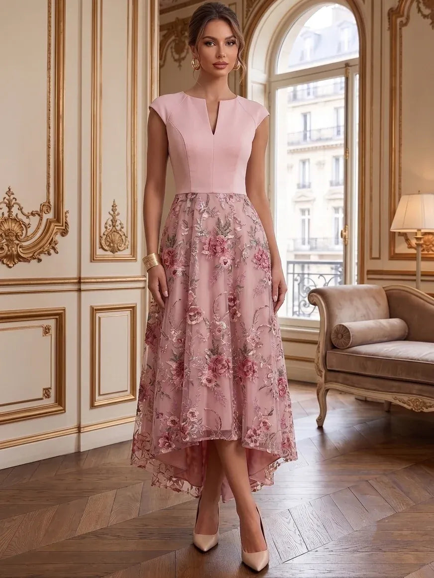 Loverlm blush pink cap sleeve high-low wedding guest dress with floral embroidered skirt front view