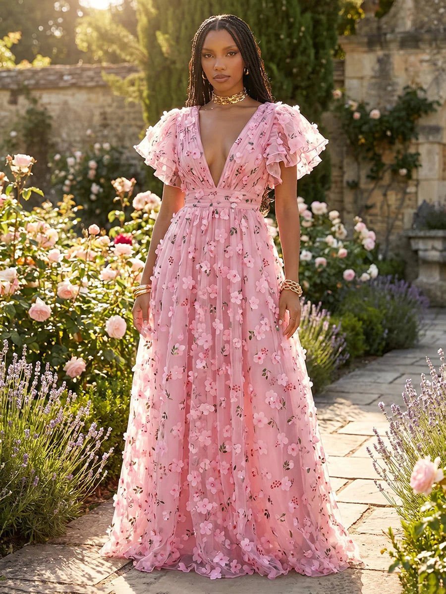 Pink floral tulle wedding guest dress with plunging V-neckline, layered ruffle sleeves, 3D floral appliques, ruched waist and floor-length A-line skirt by Loverlm