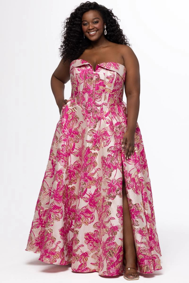 Plus size blue and gold floral jacquard A-line prom dress with strapless sweetheart neckline, structured corset bodice, front slit, and floor-length skirt